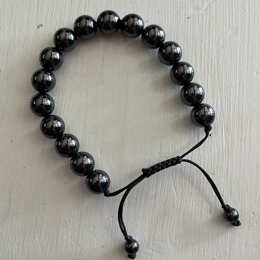Magnetic 9mm hematite bead healing bolo bracelet.
